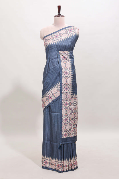 Blue ikkat style tussar saree with contrast border and printed Pallu