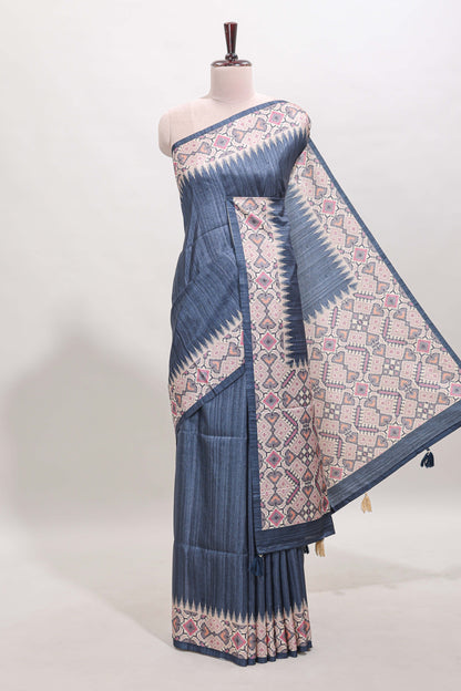 Blue ikkat style tussar saree with contrast border and printed Pallu