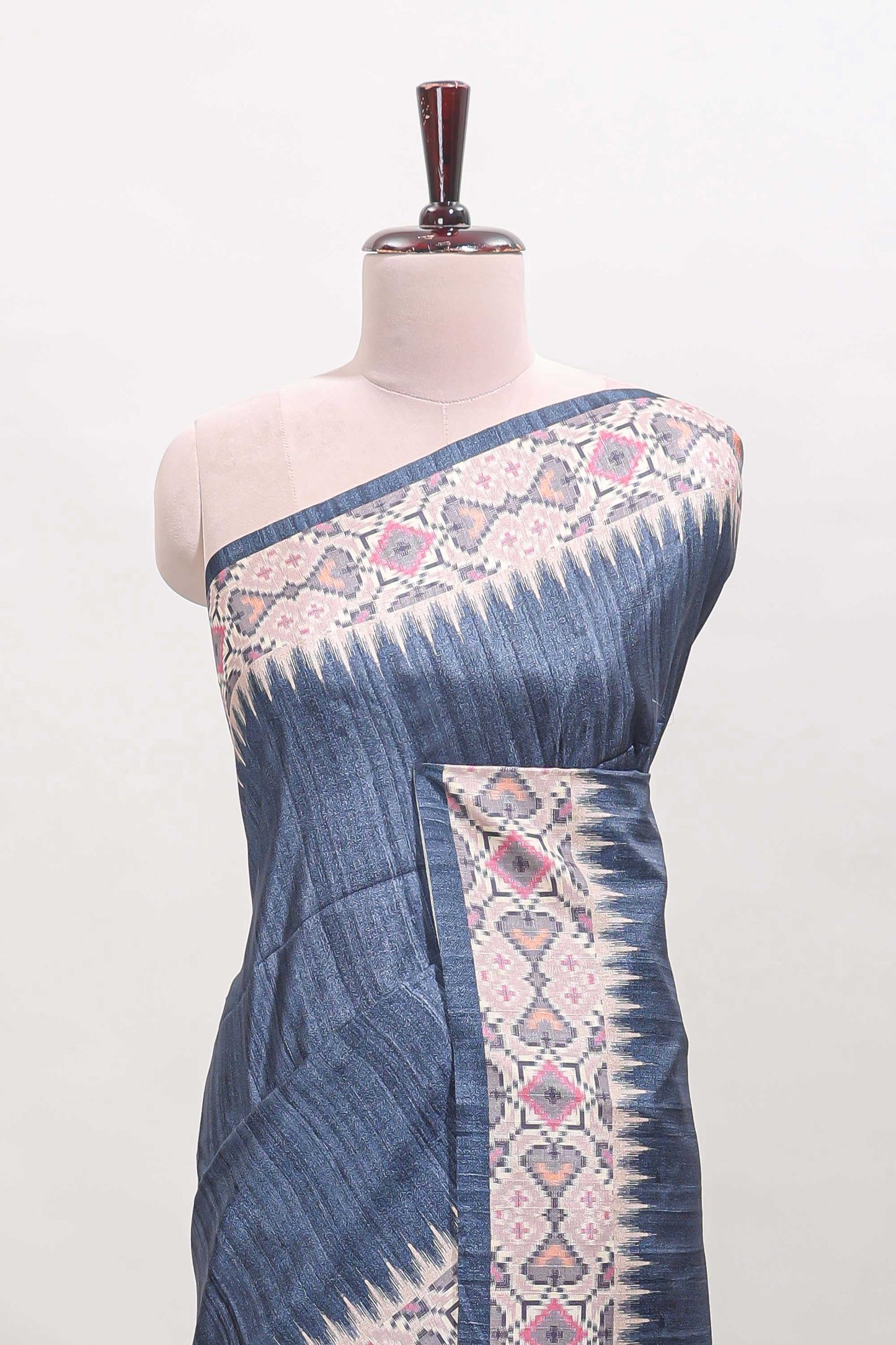 Blue ikkat style tussar saree with contrast border and printed Pallu