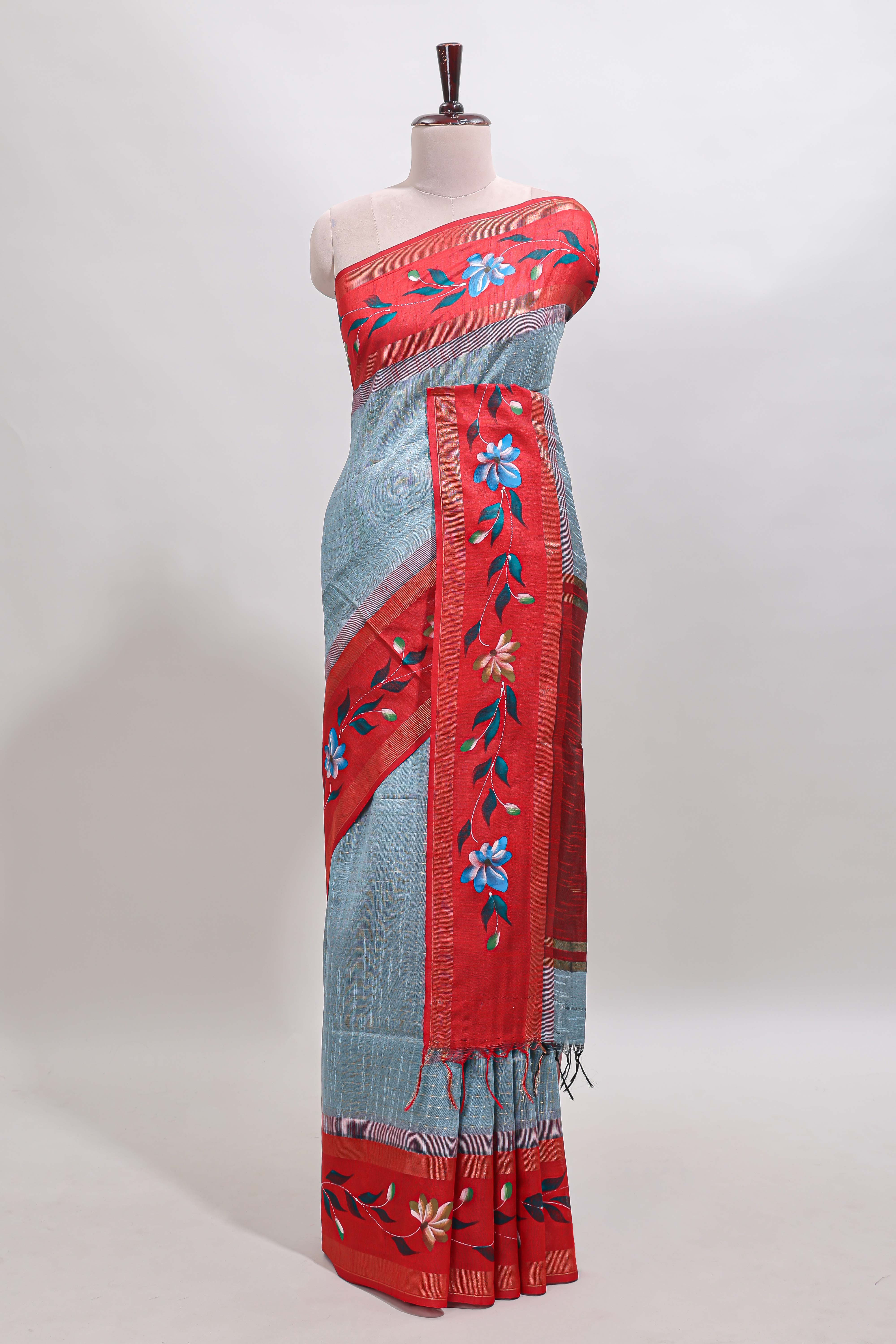Blue checked semi tussar saree with contrast floral vine border and blouse