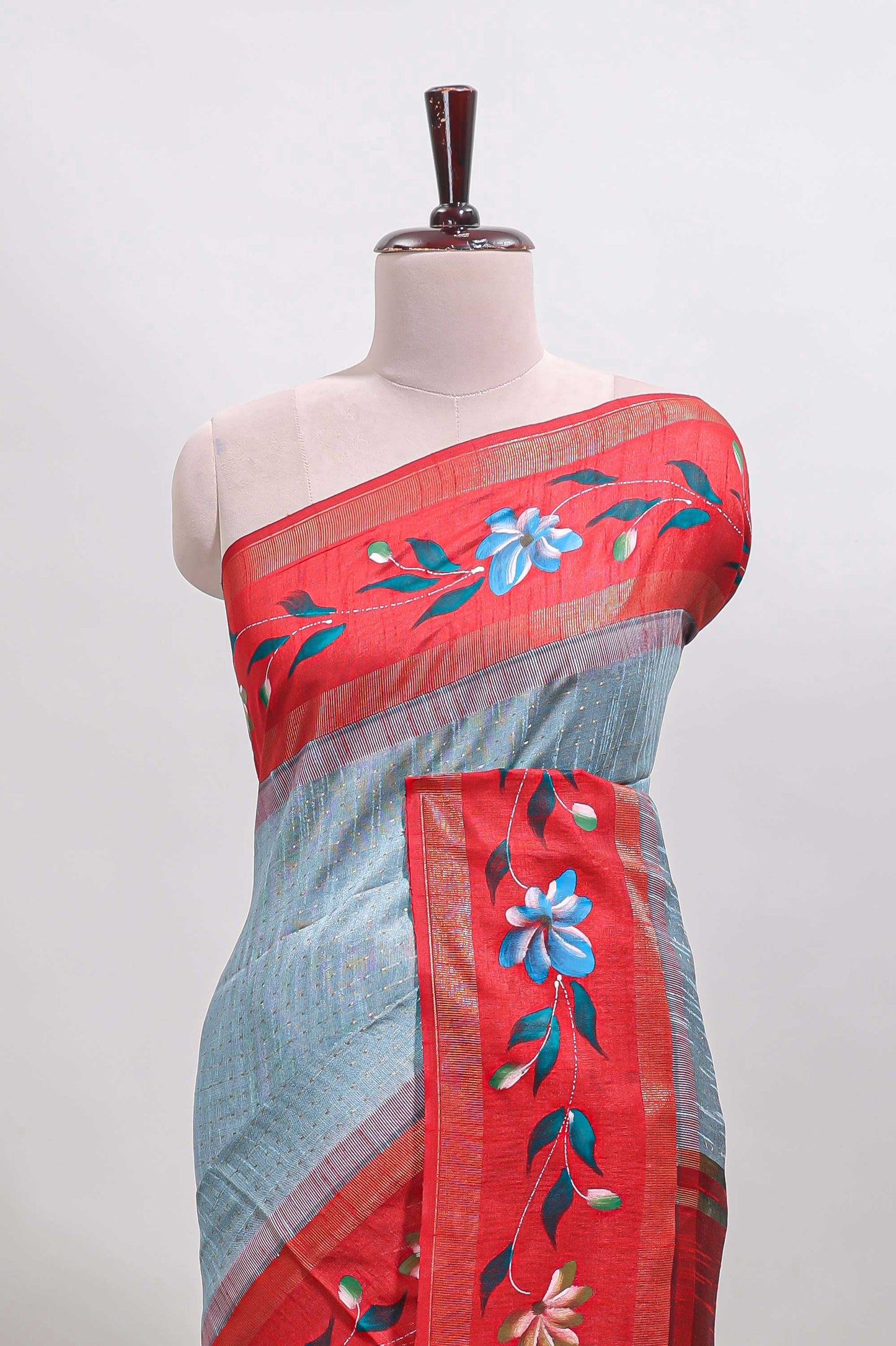 Blue checked semi tussar saree with contrast floral vine border and blouse