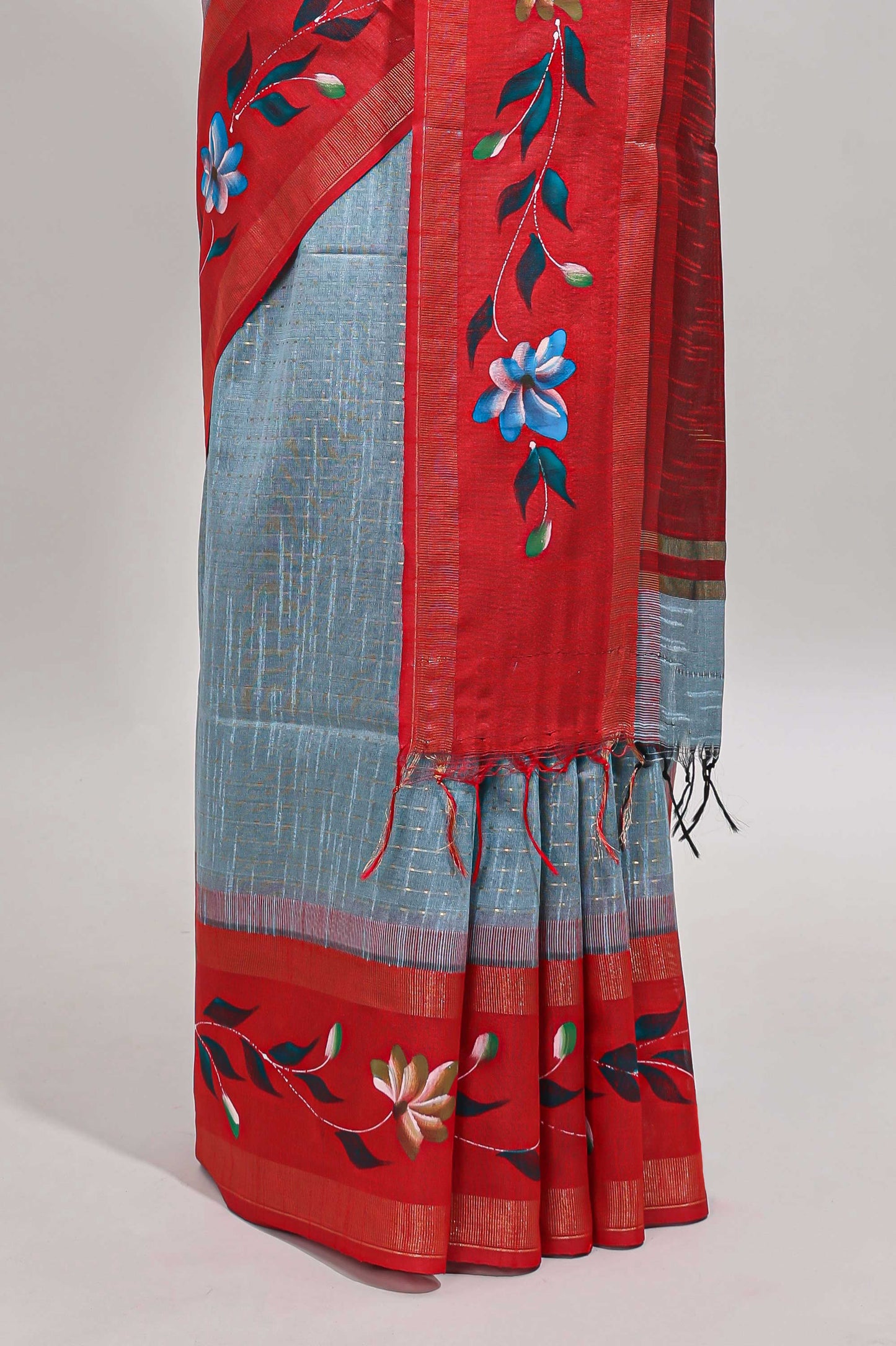 Blue checked semi tussar saree with contrast floral vine border and blouse