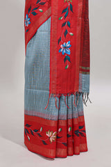 Blue checked semi tussar saree with contrast floral vine border and blouse