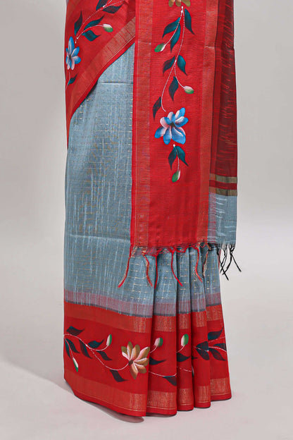 Blue checked semi tussar saree with contrast floral vine border and blouse
