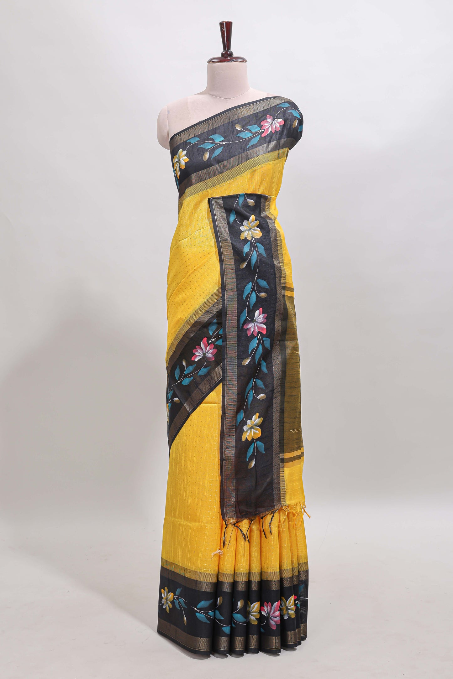 Yellow checked semi tussar saree with contrast floral vine border and blouse