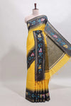 Yellow checked semi tussar saree with contrast floral vine border and blouse