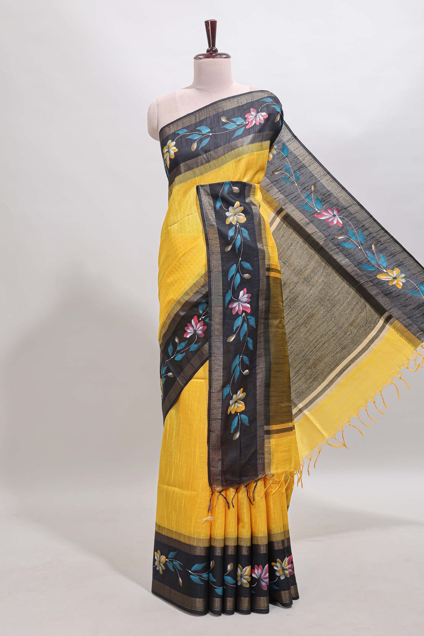 Yellow checked semi tussar saree with contrast floral vine border and blouse