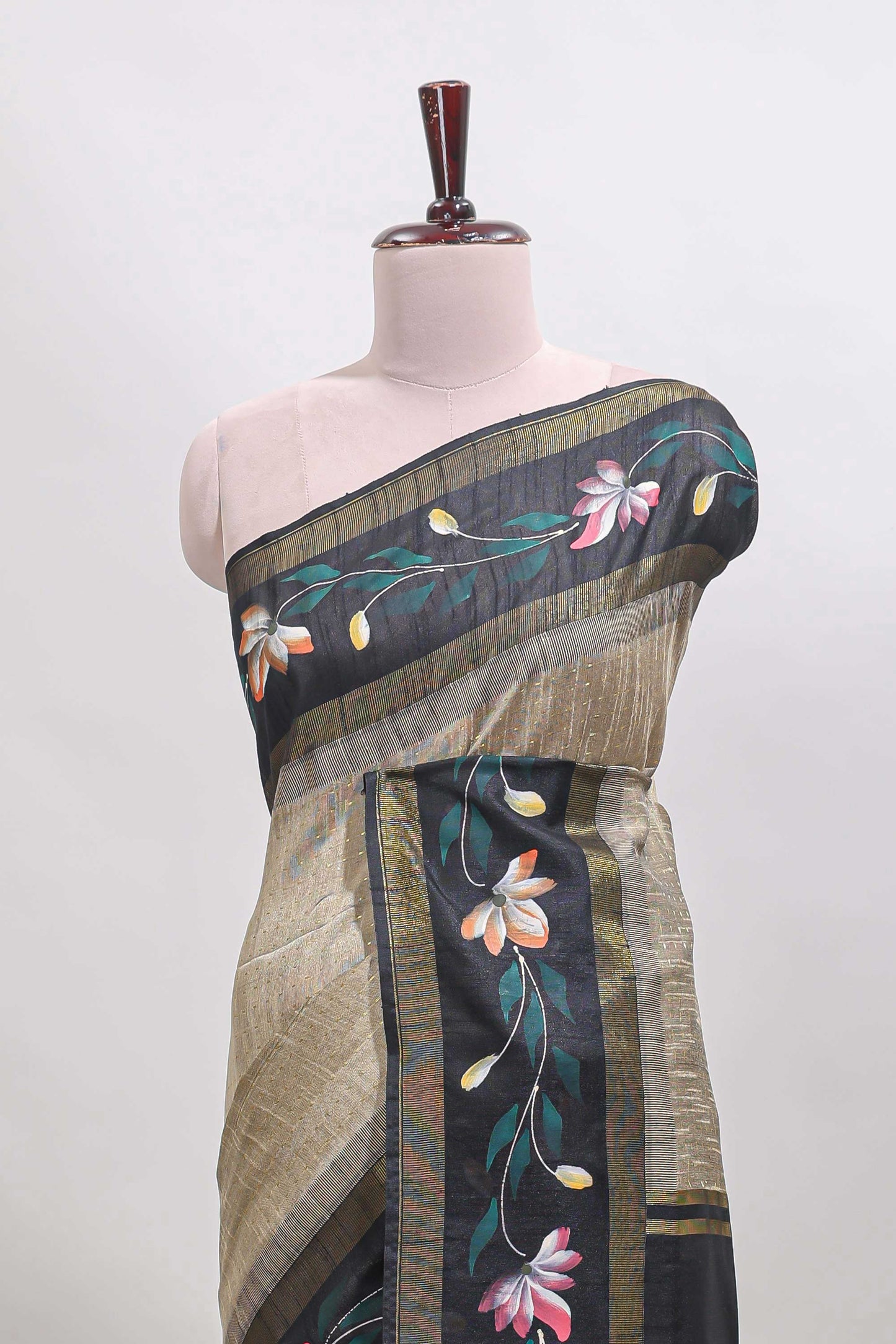Beige checked semi tussar saree with contrast floral vine border and blouse