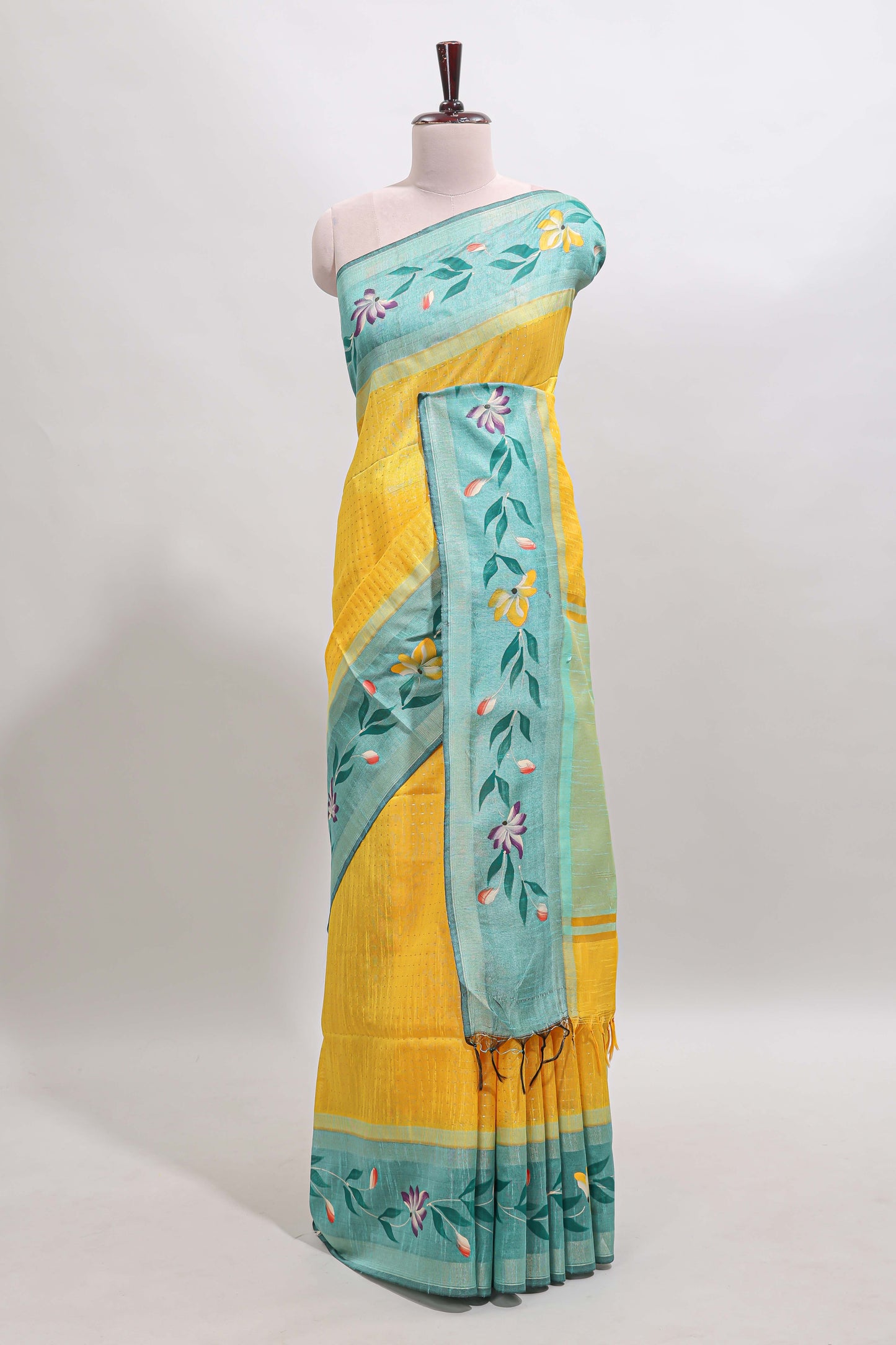 Yellow checked semi tussar saree with contrast floral vine border and blouse