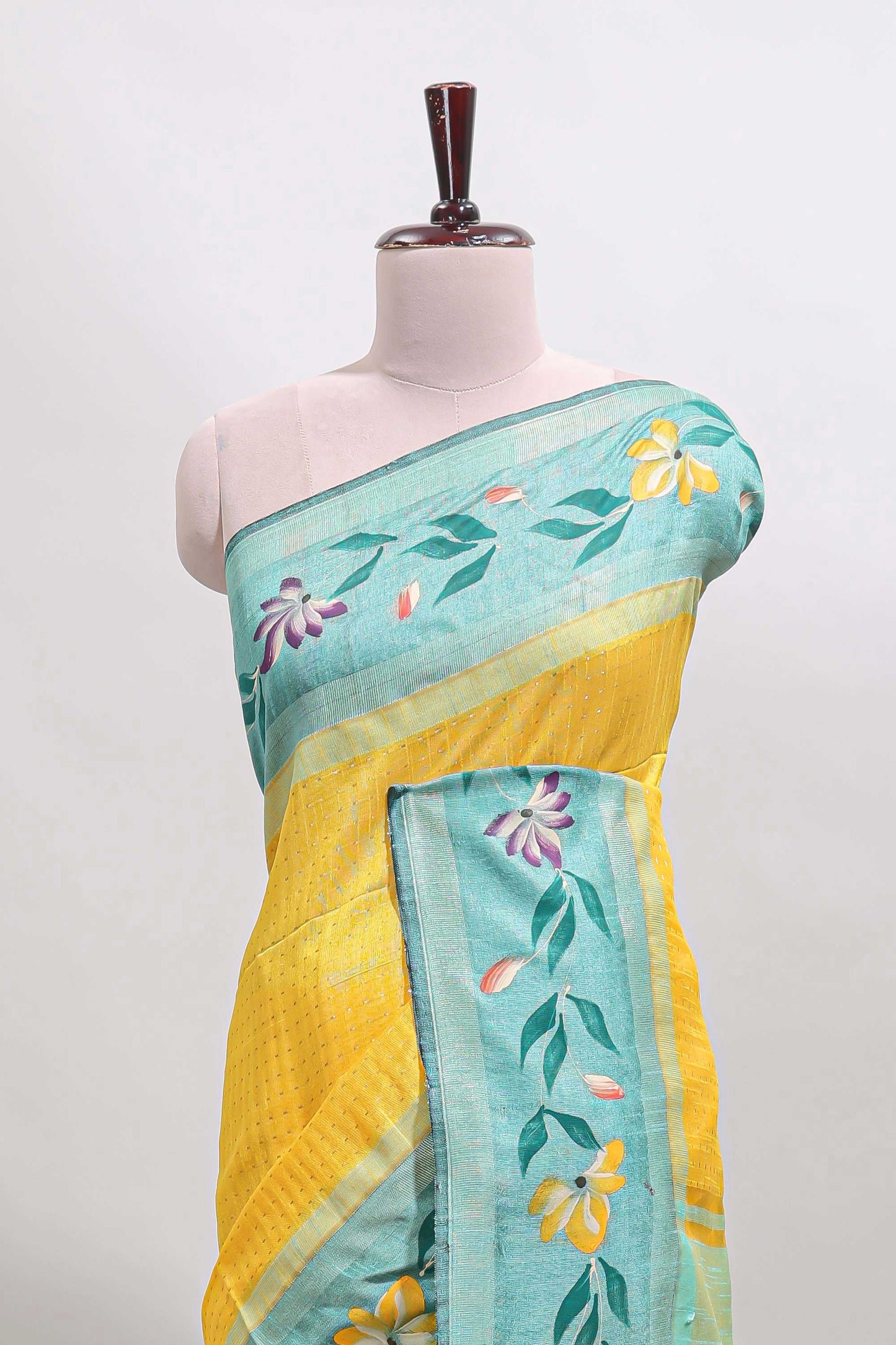 Yellow checked semi tussar saree with contrast floral vine border and blouse