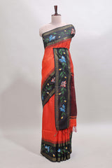 Orange checked semi tussar saree with contrast floral vine border and blouse