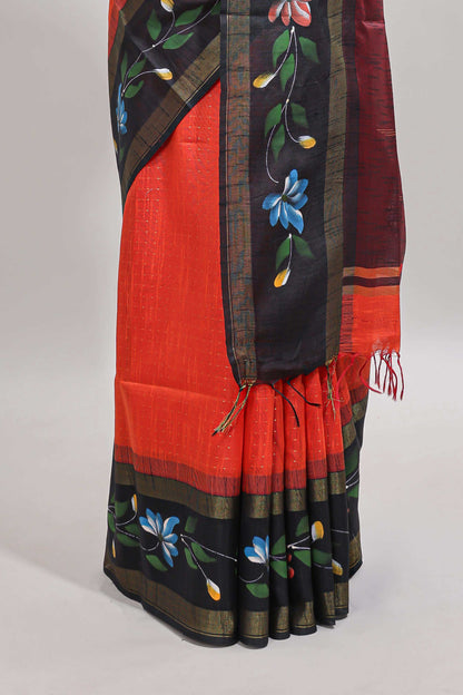 Orange checked semi tussar saree with contrast floral vine border and blouse