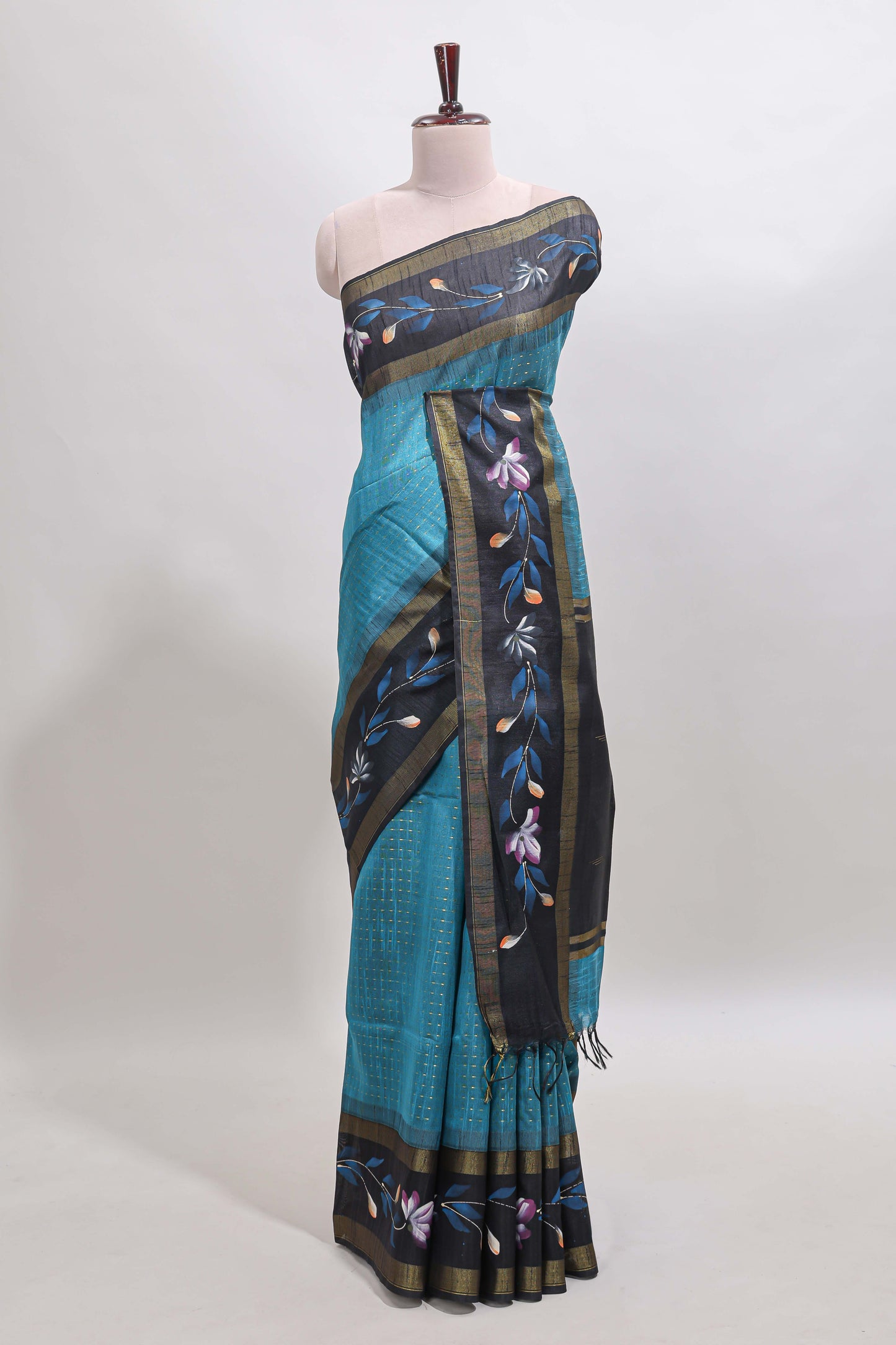Teal blue checked semi tussar saree with contrast floral vine border and blouse