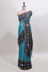 Teal blue checked semi tussar saree with contrast floral vine border and blouse