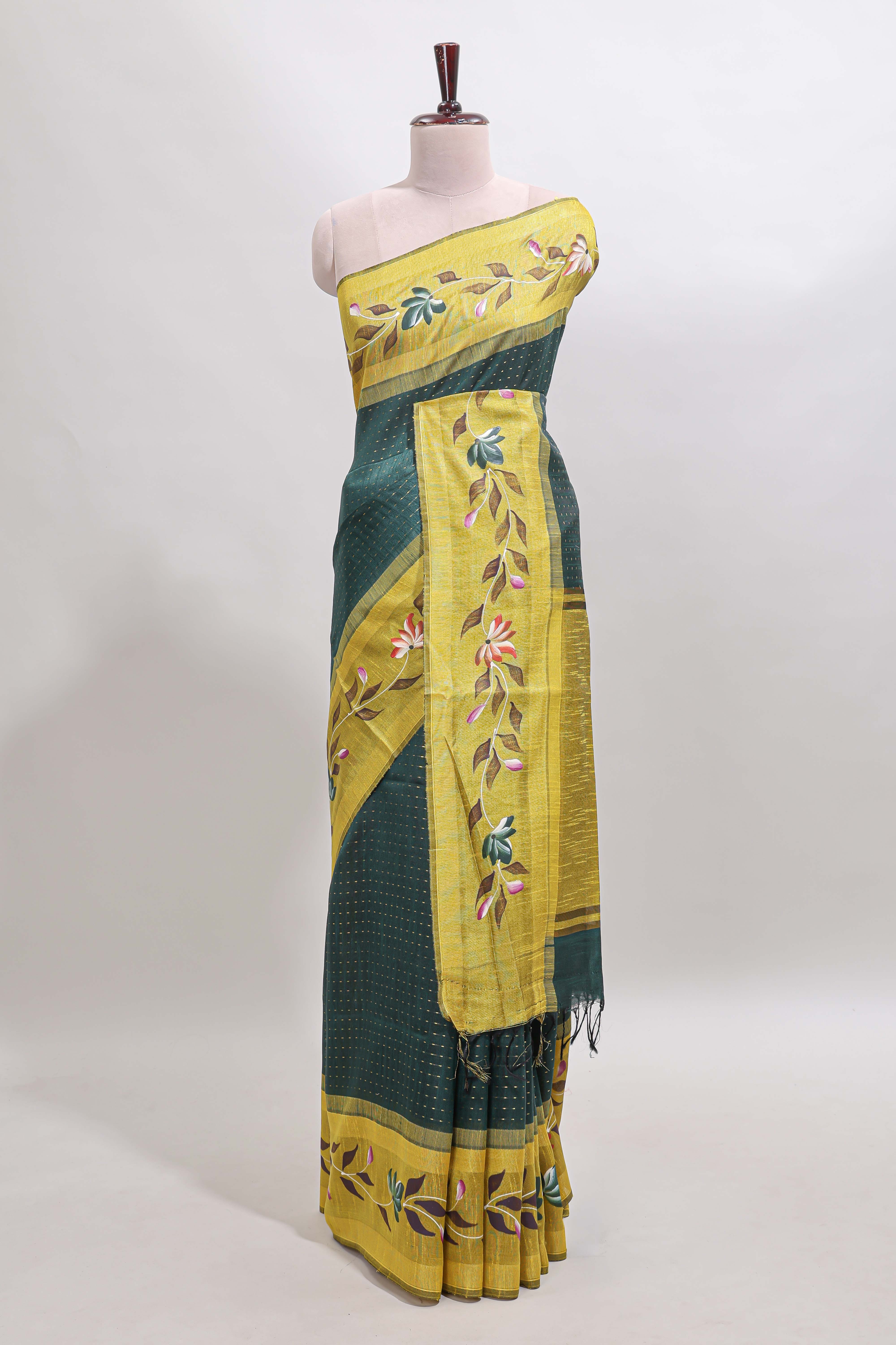 Green checked semi tussar saree with contrast floral vine border and blouse