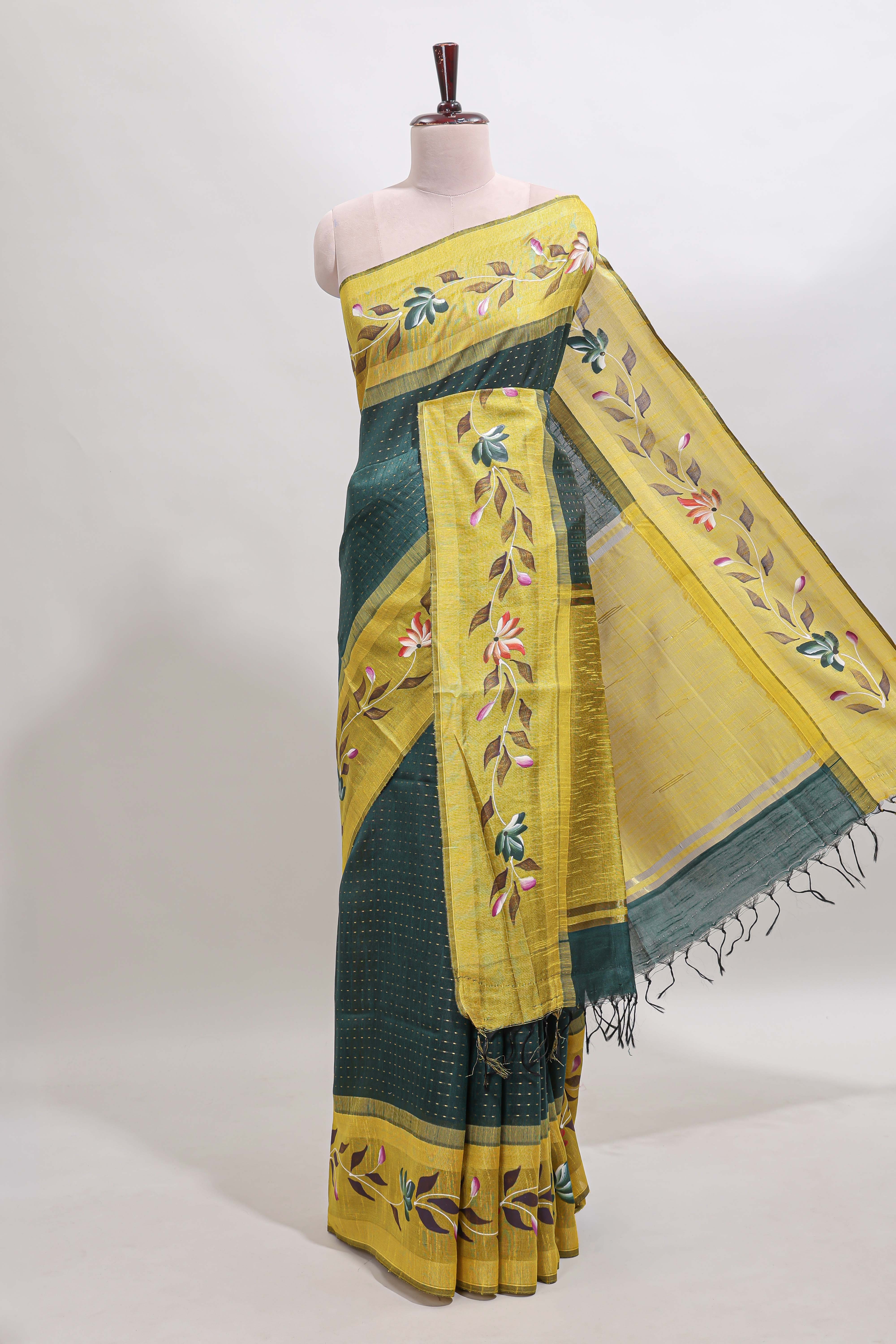 Green checked semi tussar saree with contrast floral vine border and blouse