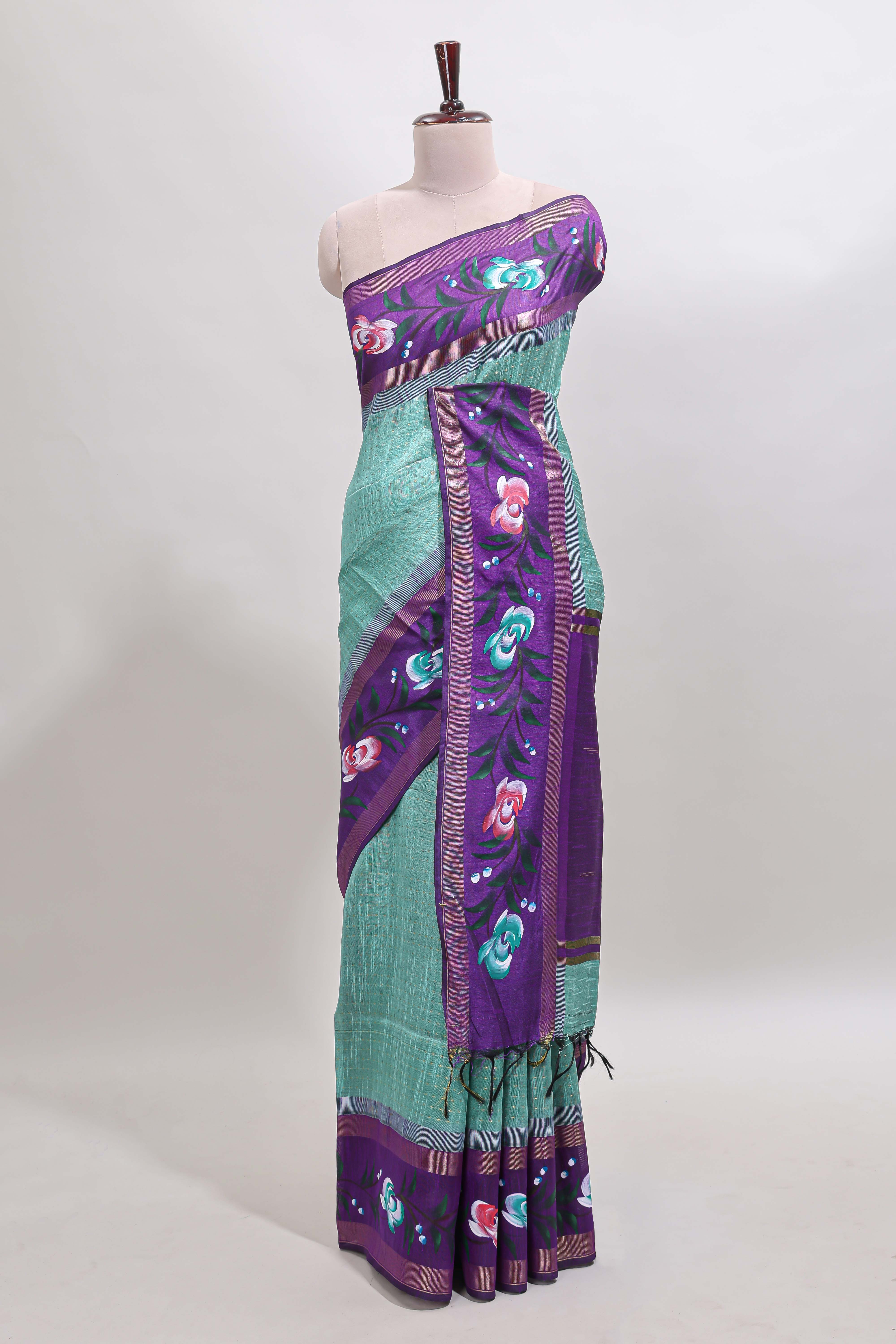 Green checked semi tussar saree with contrast violet floral vine border and blouse