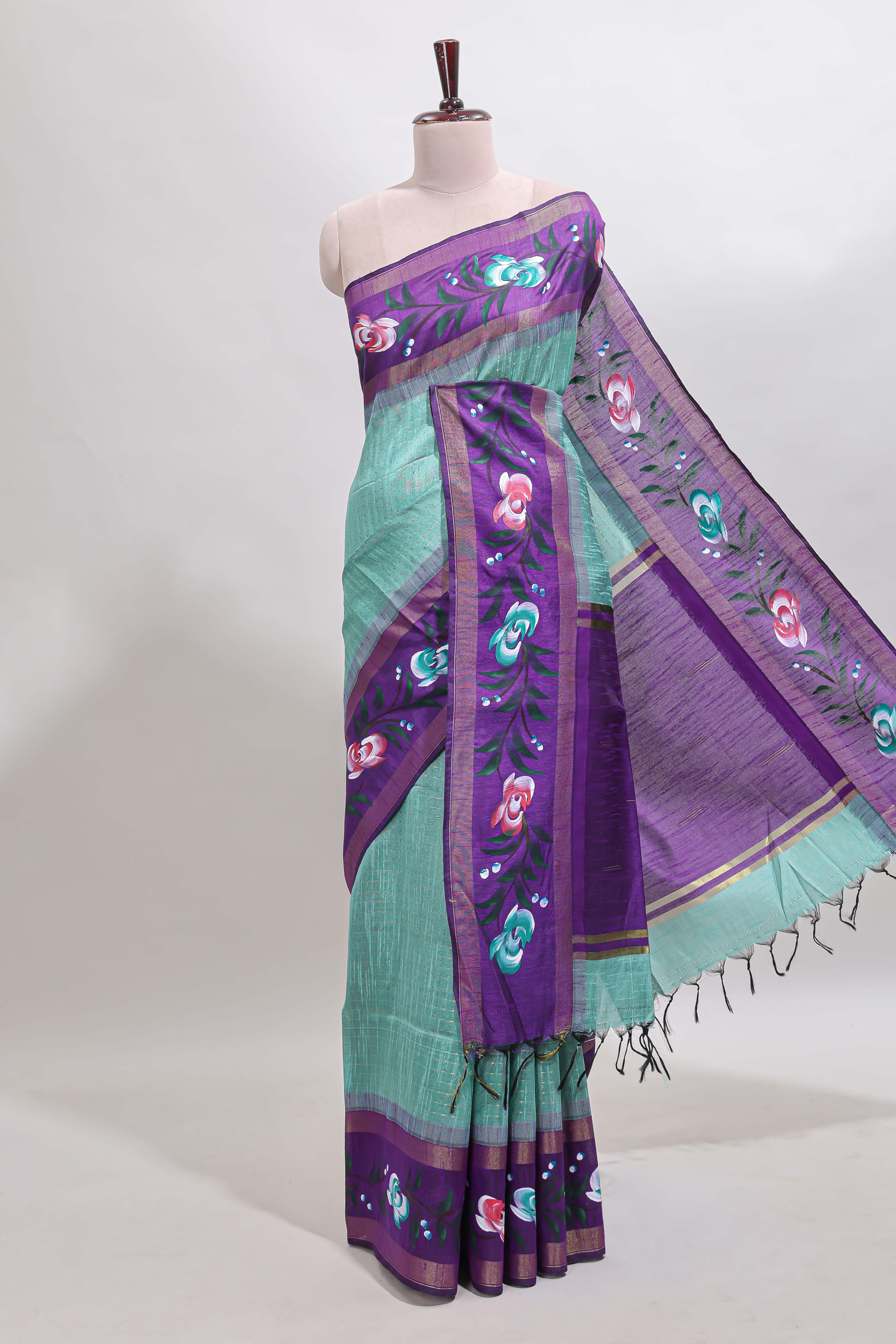Green checked semi tussar saree with contrast violet floral vine border and blouse