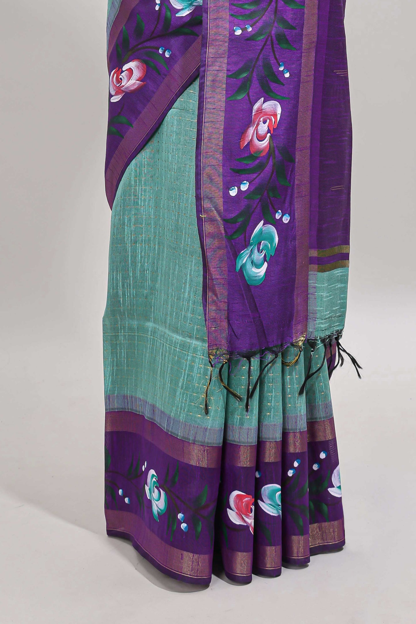 Green checked semi tussar saree with contrast violet floral vine border and blouse