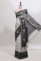 Grey checked semi tussar saree with contrast violet floral vine border and blouse