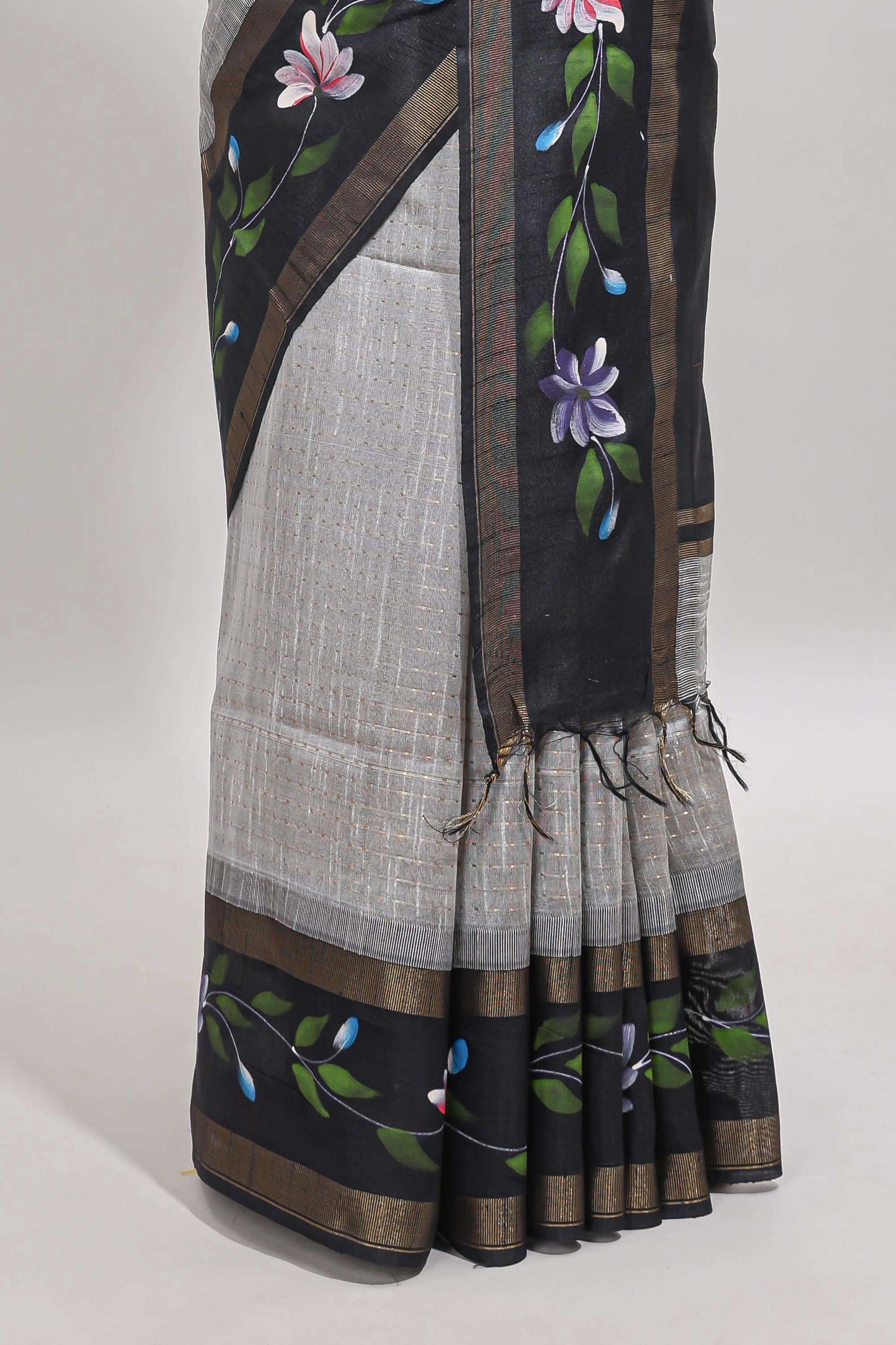 Grey checked semi tussar saree with contrast violet floral vine border and blouse