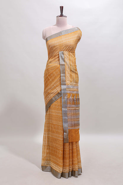 Mustard geometric design semi tussar saree with contrast border and matching blouse