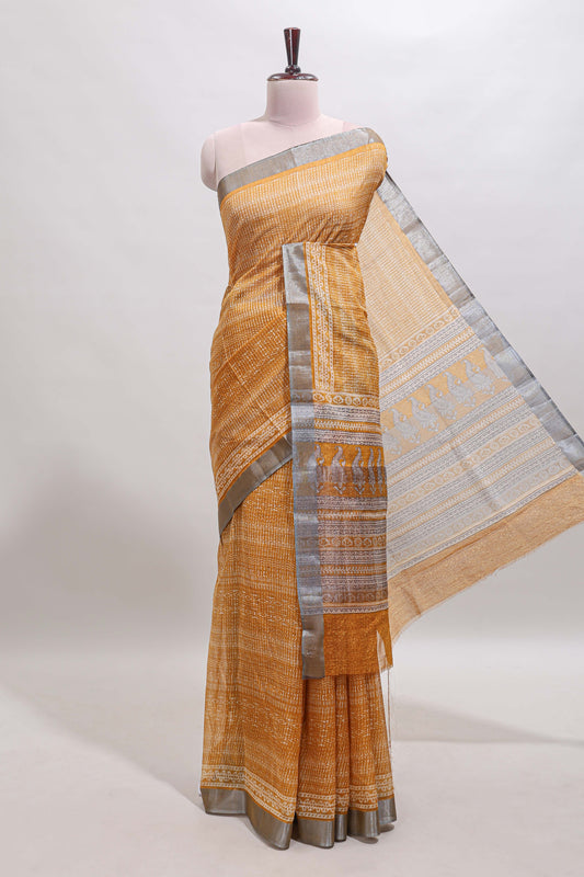 Mustard geometric design semi tussar saree with contrast border and matching blouse