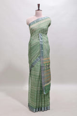 Green geometric design semi tussar saree with contrast border and matching blouse