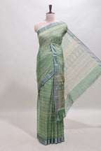 Green geometric design semi tussar saree with contrast border and matching blouse