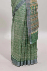 Green geometric design semi tussar saree with contrast border and matching blouse