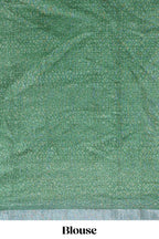 Green geometric design semi tussar saree with contrast border and matching blouse