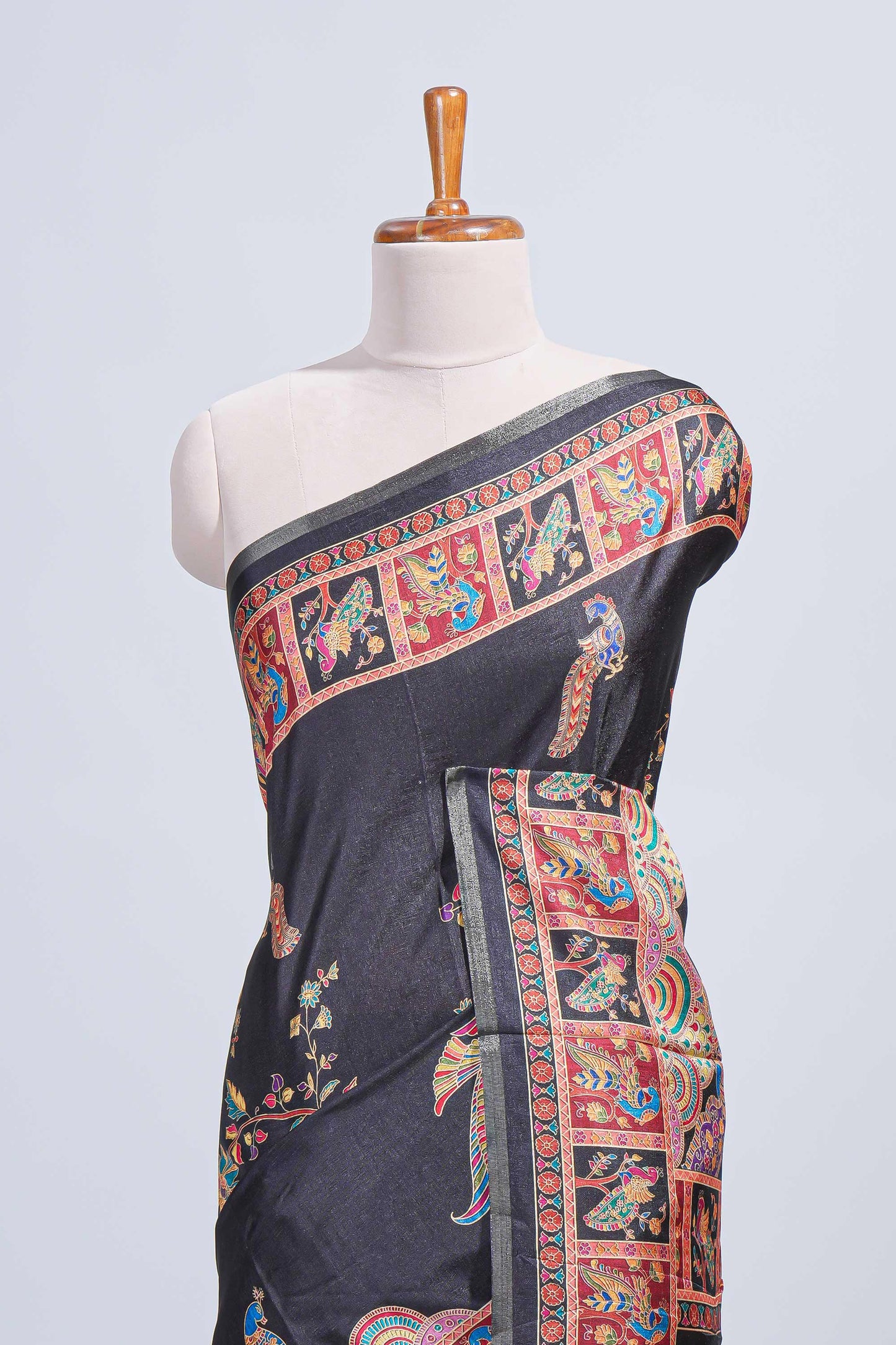 Black madhubani style floral & peacock design tussar saree with self border and matching blouse