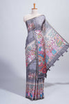 Grey kalamkari style pattachitra storytelling motifs tussar saree with self border and matching blouse