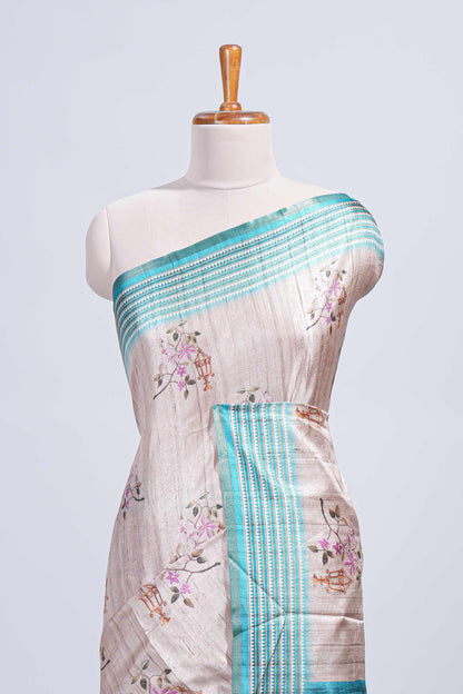 Beige floral & cage print motifs tussar saree with contrast border and blouse