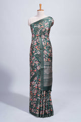 Green floral design tussar saree with self zari border and matching blouse