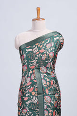 Green floral design tussar saree with self zari border and matching blouse