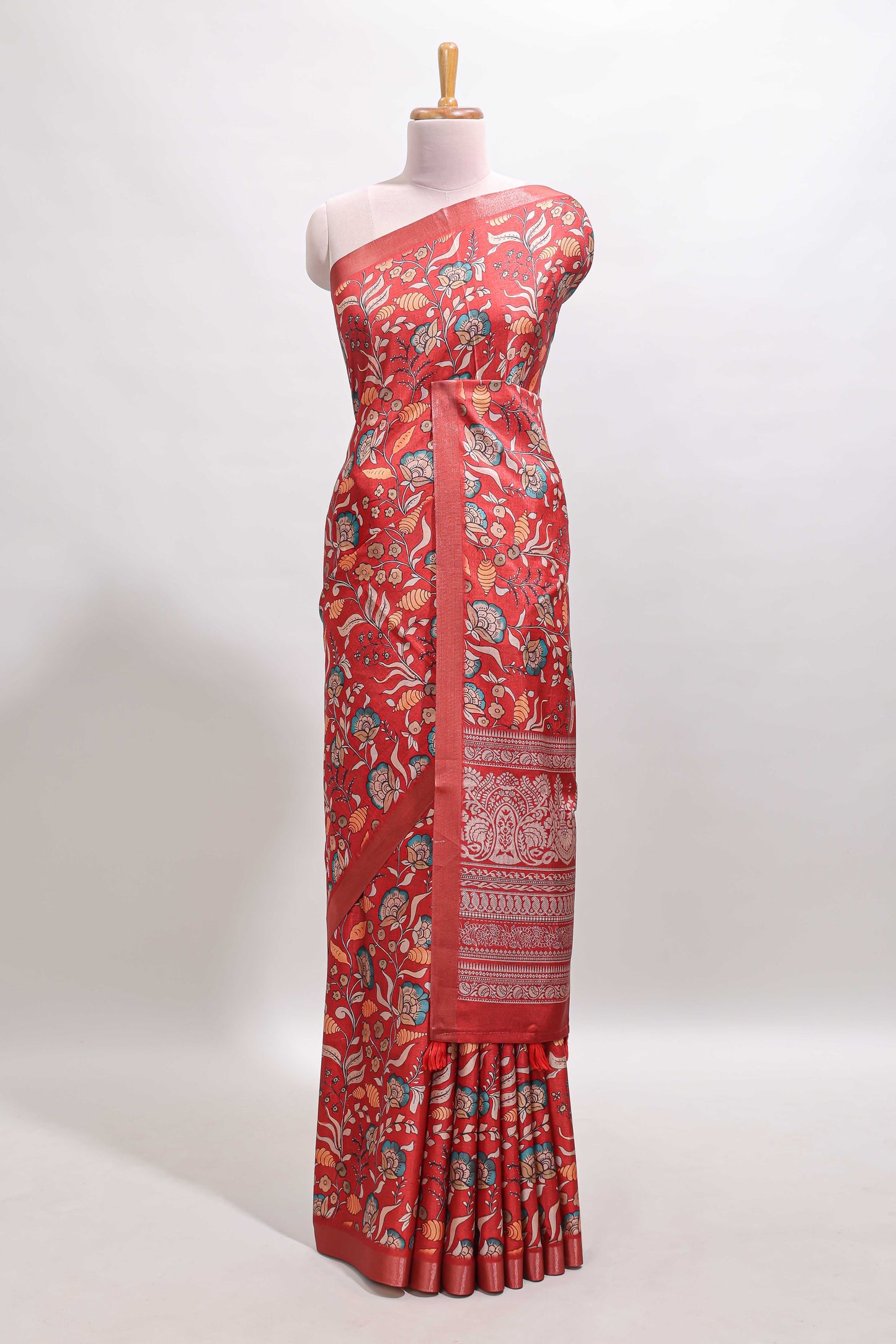Red floral design tussar saree with self zari border and matching blouse