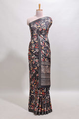 Black floral design tussar saree with self zari border and matching blouse