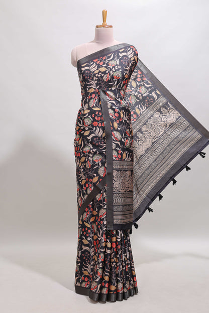 Black floral design tussar saree with self zari border and matching blouse