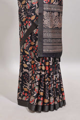 Black floral design tussar saree with self zari border and matching blouse