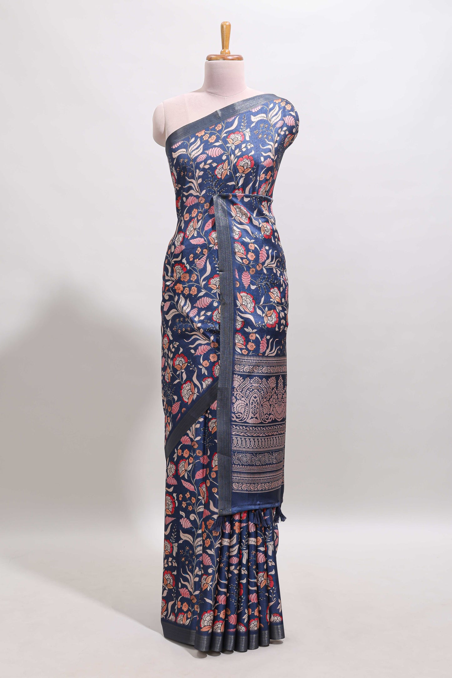 Blue floral design tussar saree with self zari border and matching blouse