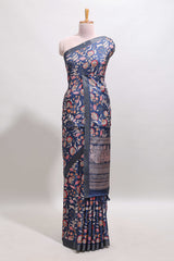 Blue floral design tussar saree with self zari border and matching blouse