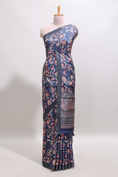 Blue floral design tussar saree with self zari border and matching blouse