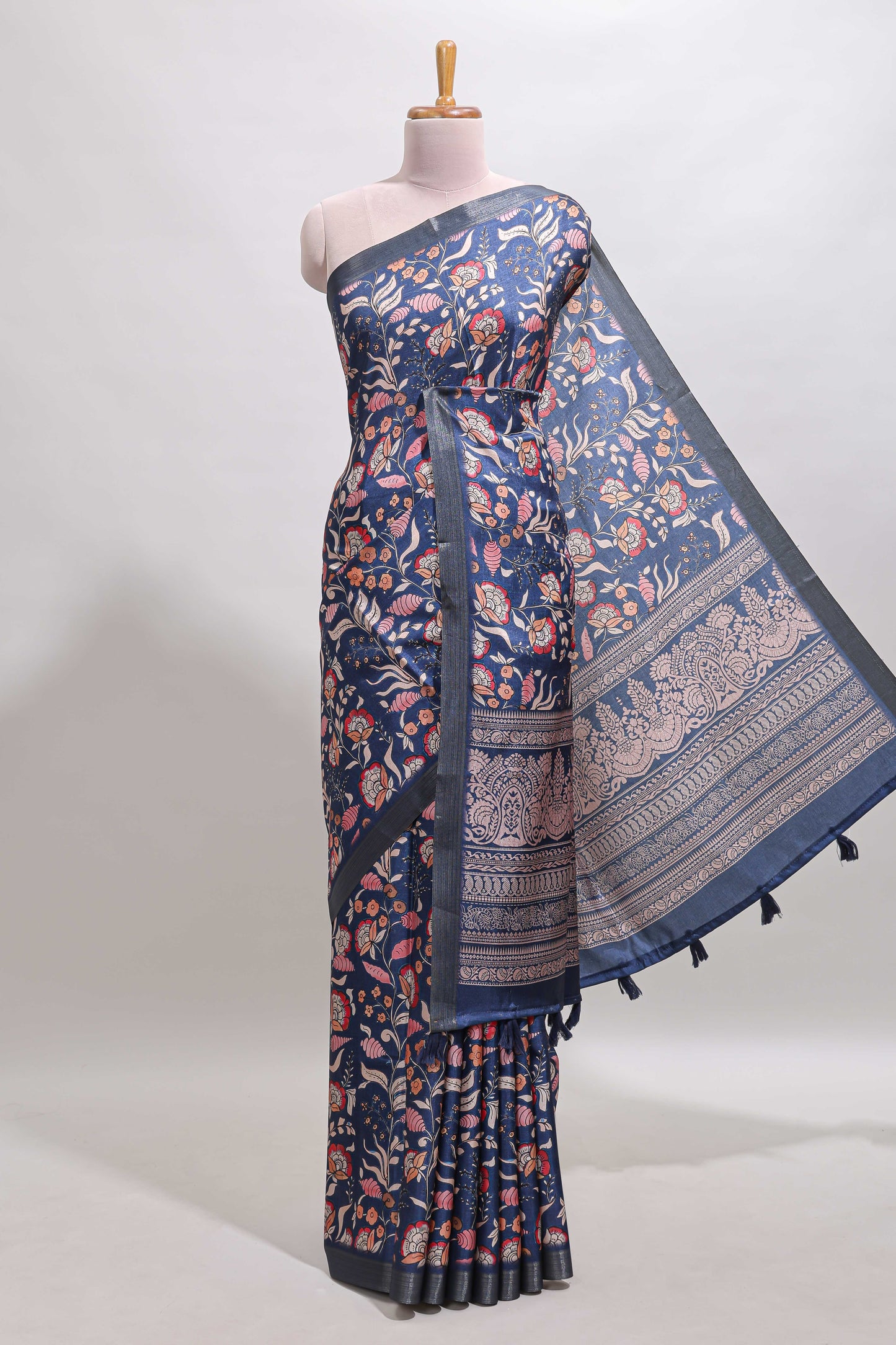 Blue floral design tussar saree with self zari border and matching blouse