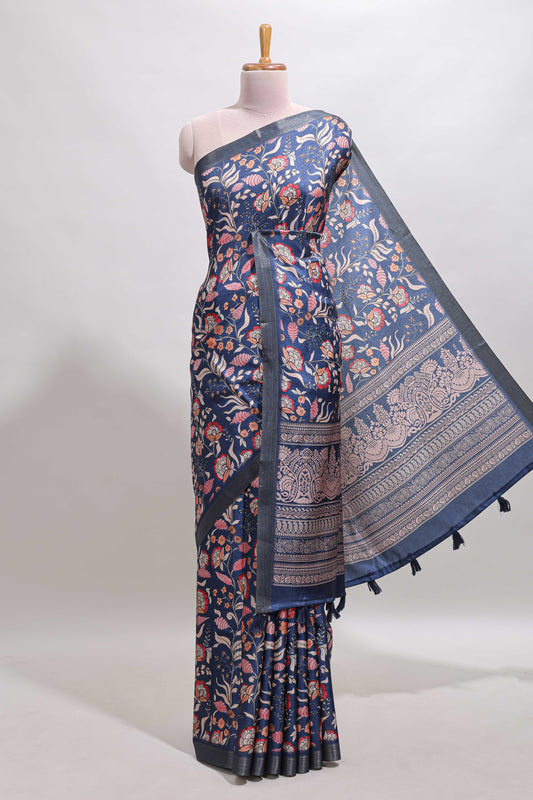 Blue floral design tussar saree with self zari border and matching blouse
