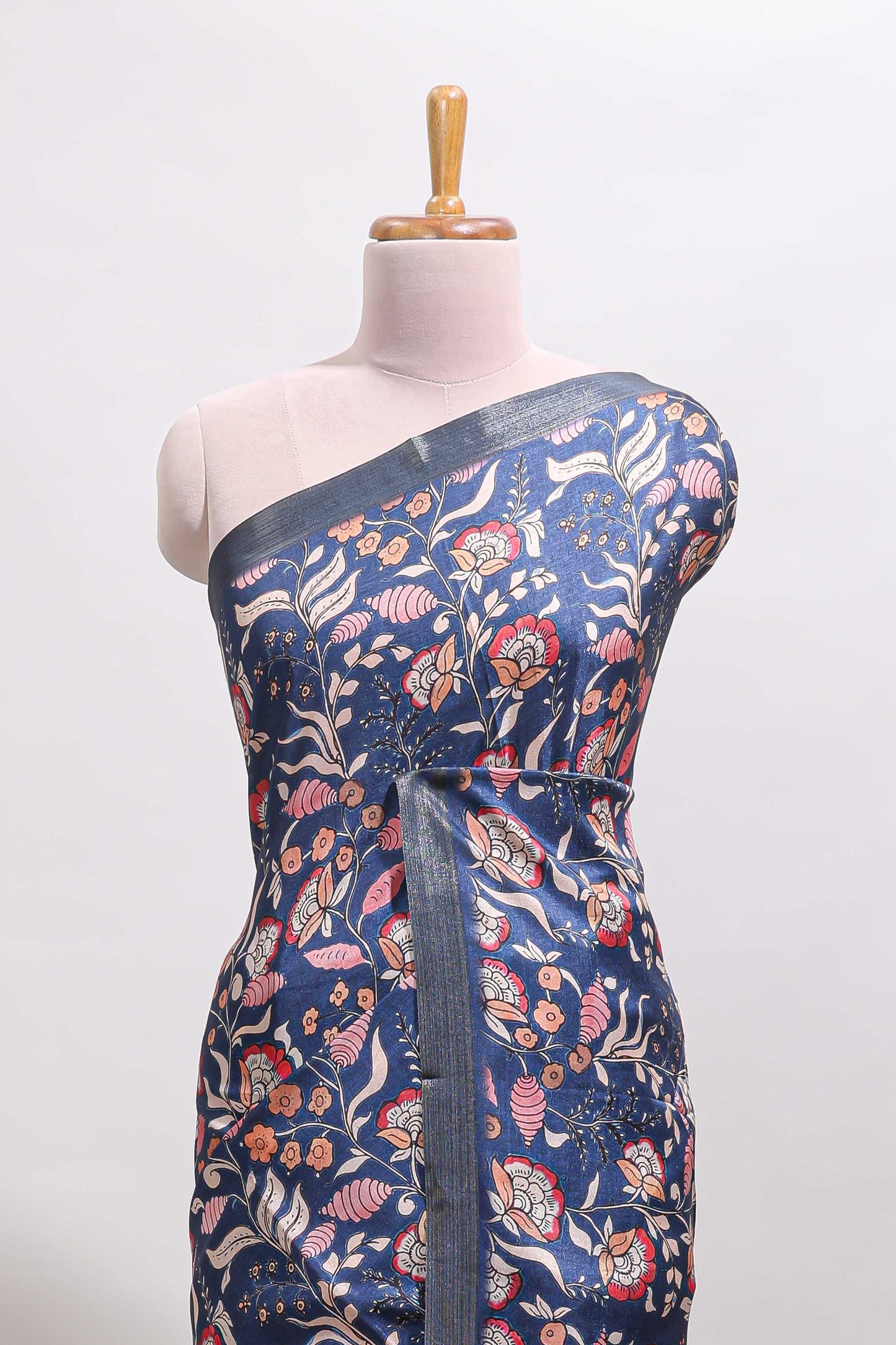 Blue floral design tussar saree with self zari border and matching blouse