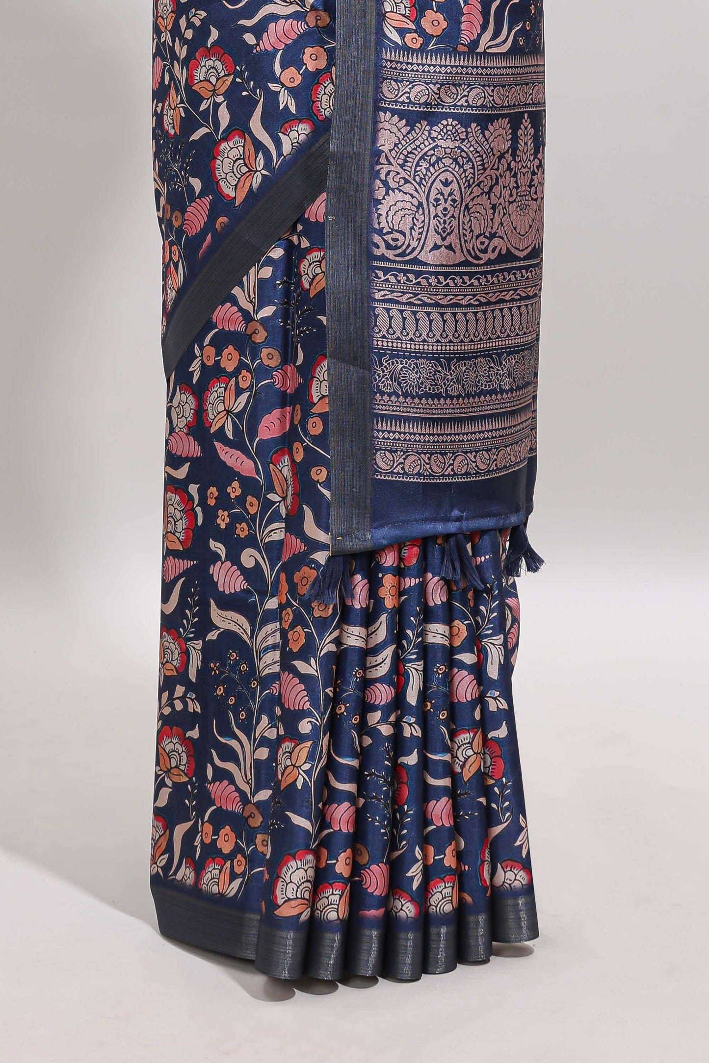 Blue floral design tussar saree with self zari border and matching blouse