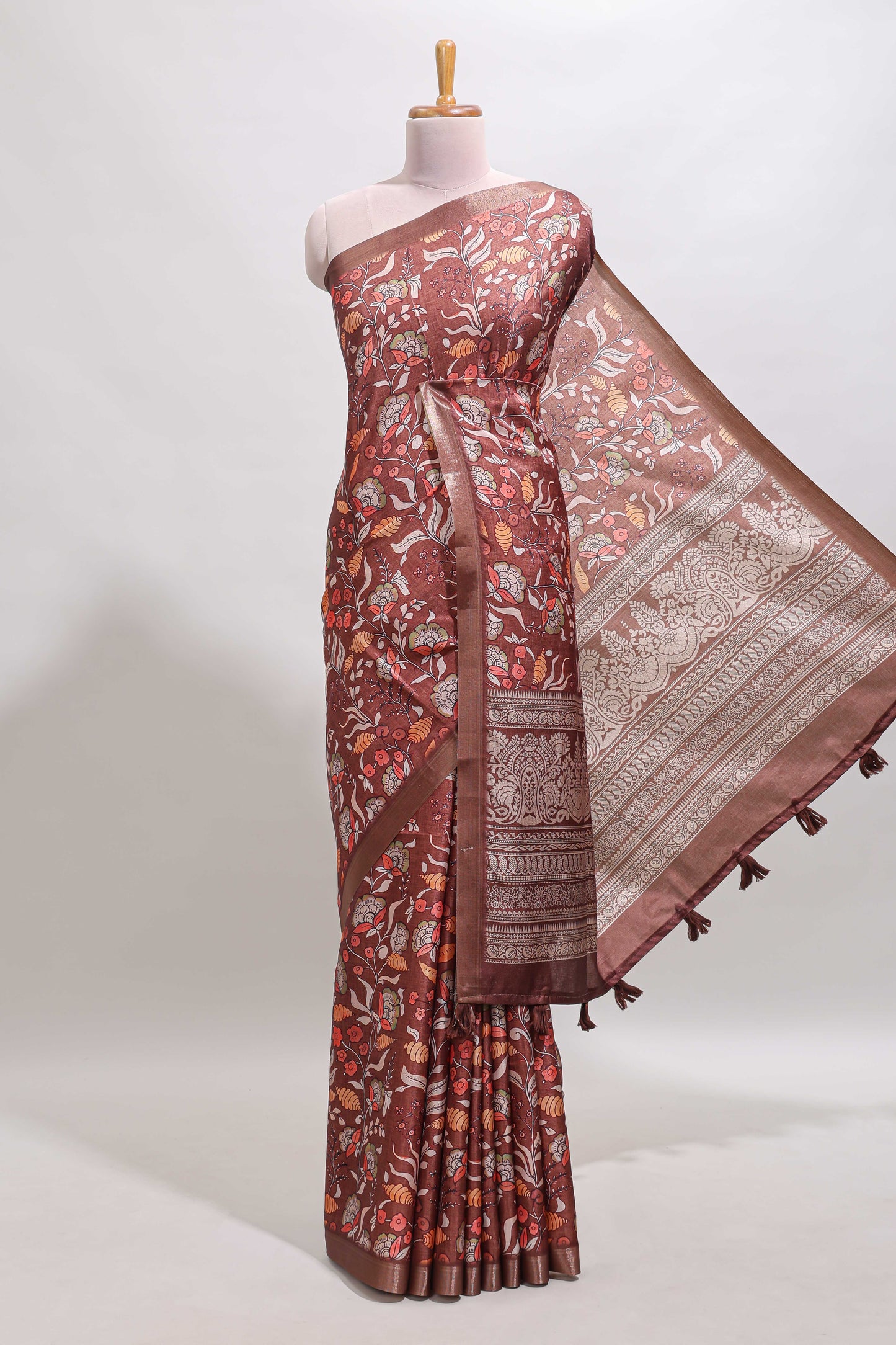 Brown floral design tussar saree with self zari border and matching blouse