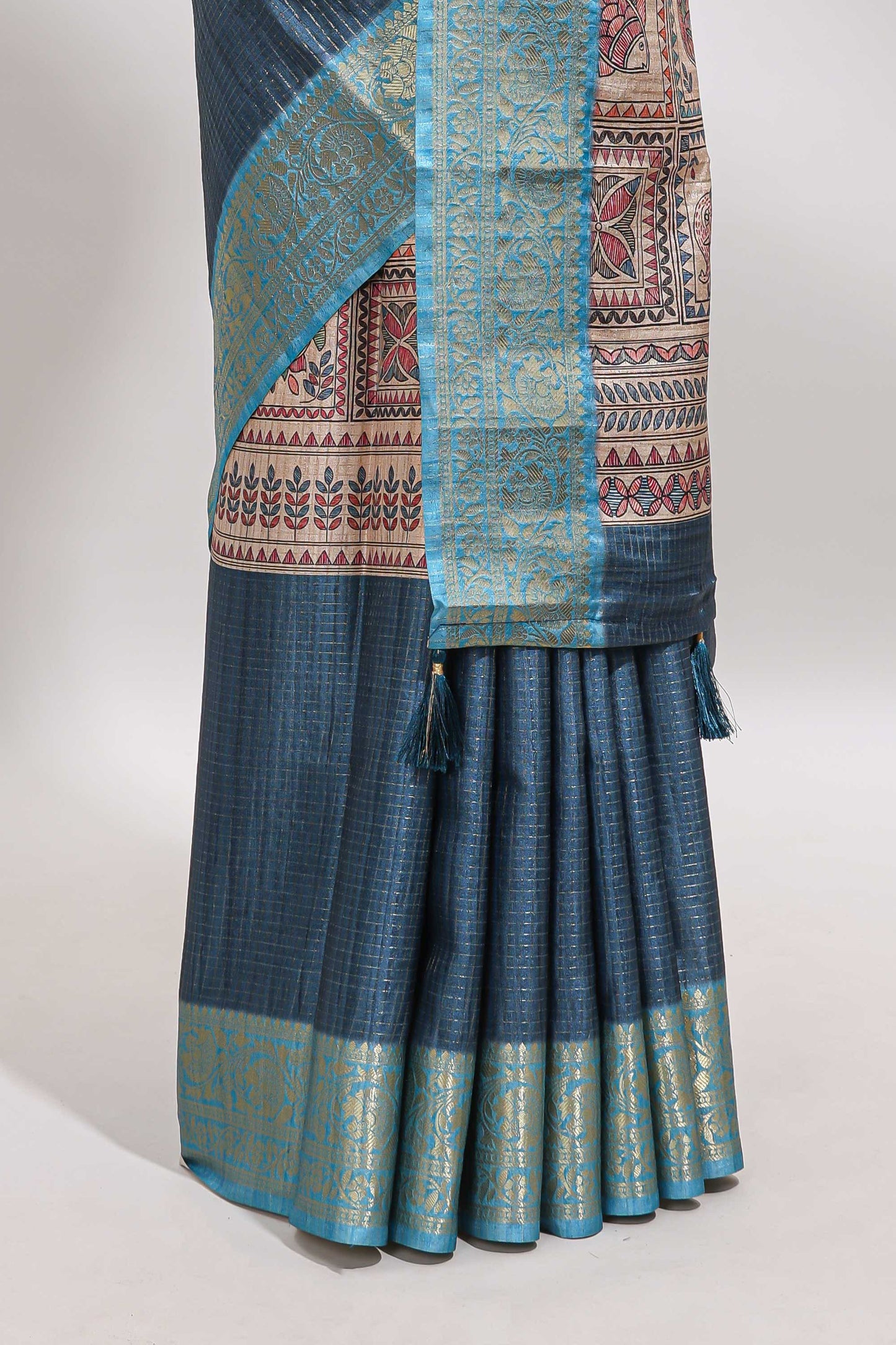 Blue checked madhubani style tussar saree with contrast zari border and matching blouse