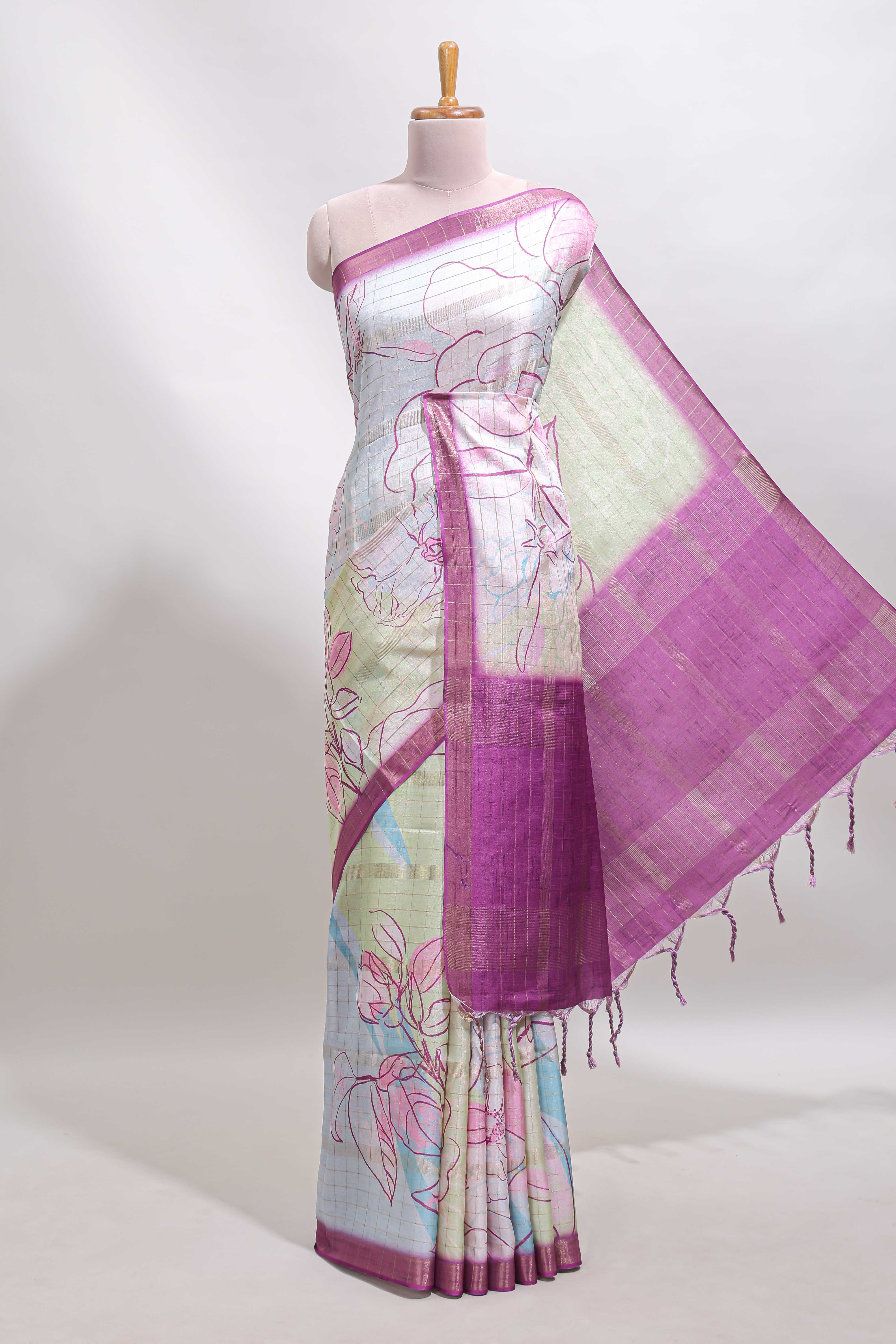 Multi color checked floral design tussar saree with contrast border and zari striped blouse